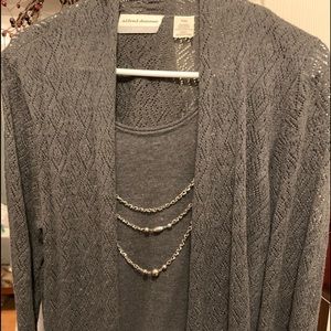 Beautiful two piece attached sweater with attached necklace